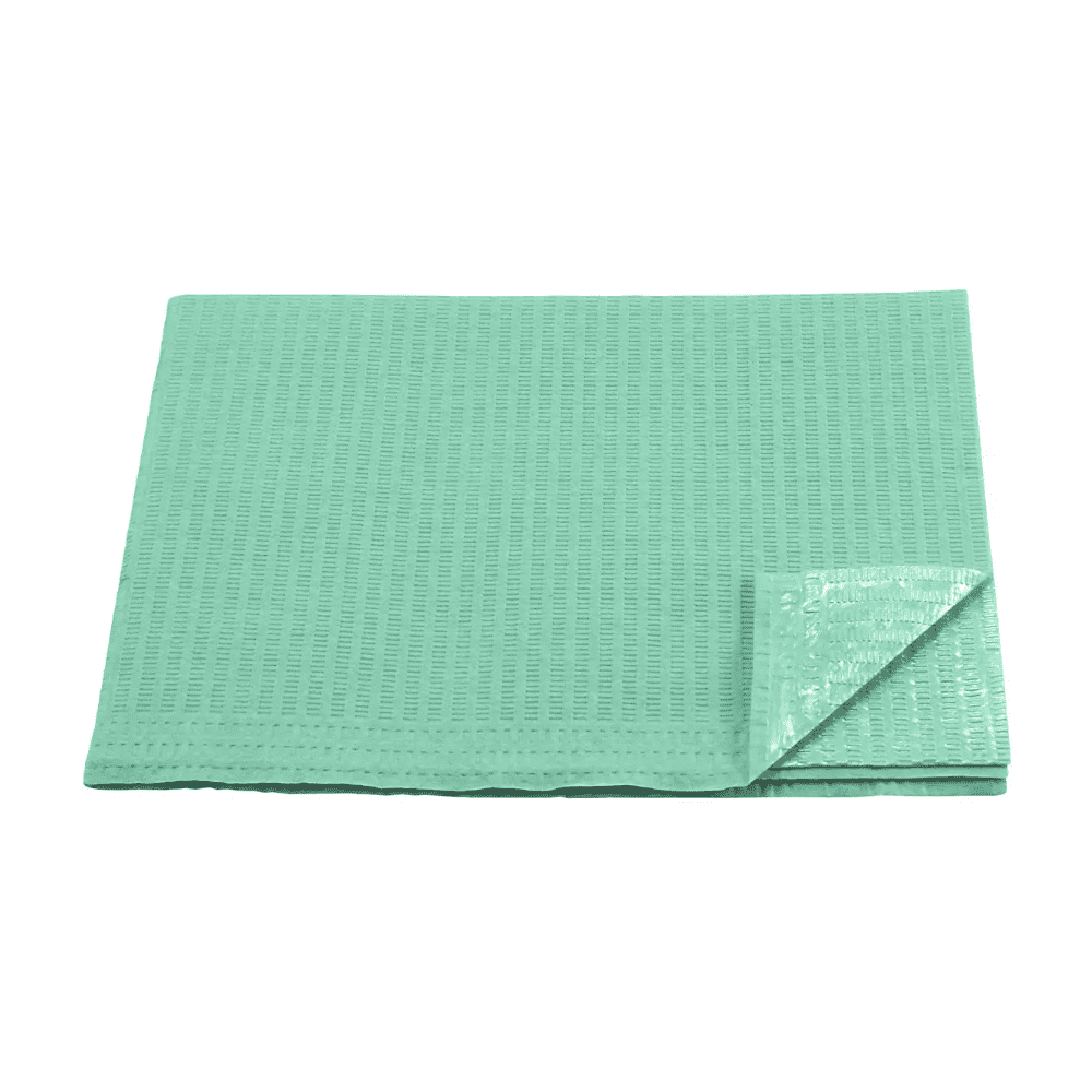 Une sous-couche absorbante verte jetable avec une structure matelassée et un dos en plastique, similaire aux serviettes patients, tissu/PE, vert (carton de 500 paquets) de la AMPri Handelsgesellschaft mbH. Le coin de la sous-couche est plié, rendant le matériau de support visible. La sous-couche repose sur un fond blanc.