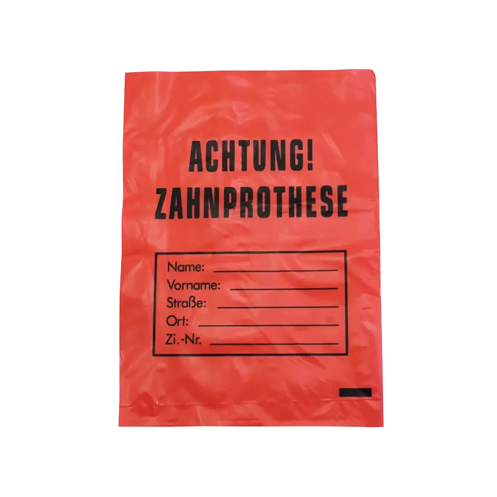 Le sac à prothèse dentaire AMPri LDPE de dimensions 17 x 24 cm présente un design rouge avec le texte noir « ATTENTION ! PROTHÈSE DENTAIRE » et des champs pour le nom, l'adresse et le numéro de chambre, afin d'assurer une identification hygiénique et facile des prothèses dentaires. Marque : AMPri Handelsgesellschaft mbH.