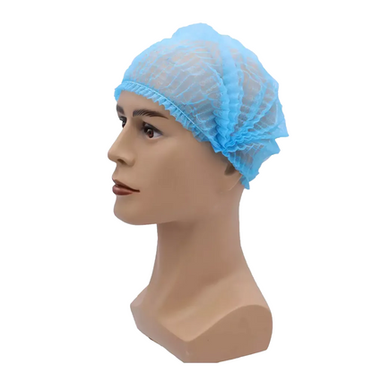Une tête de mannequin porte une Klipphaube bleue AMPri MED-COMFORT 52 cm, de AMPri Handelsgesellschaft mbH. Le filet à cheveux en polypropylène léger avec des bords élastiques épouse étroitement la tête du mannequin et offre une protection hygiénique. L'image est visible sur un fond blanc simple.