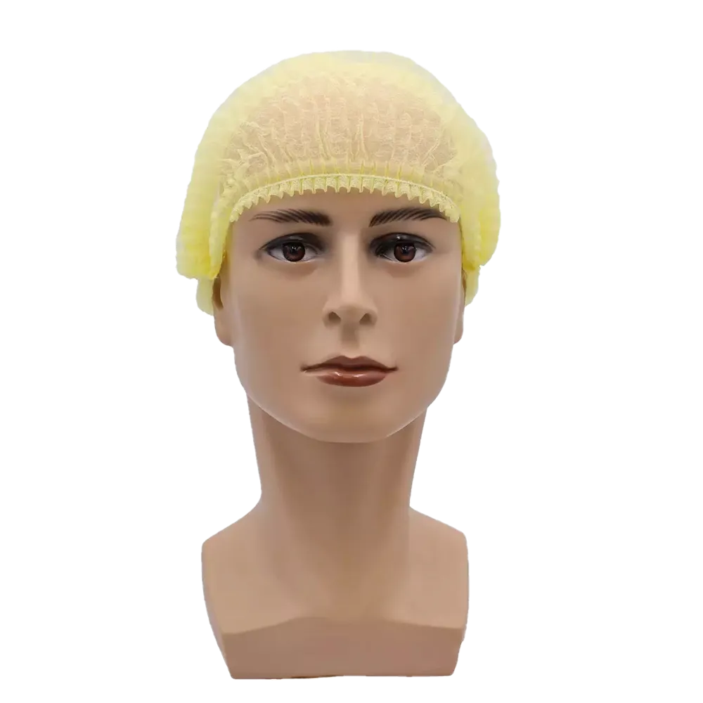 Une tête de mannequin présente une Klipphaube jaune AMPri MED-COMFORT 52 cm, fabriquée en polypropylène par la société AMPri Handelsgesellschaft mbH, avec une expression neutre devant un fond blanc simple, soulignant ainsi la protection hygiénique.