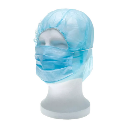 Une tête de mannequin AMPri MED-COMFORT PP, disponible en différentes couleurs chez AMPri Handelsgesellschaft mbH, présente un masque facial jetable bleu associé à une couverture de cheveux assortie en polypropylène dans le style d'une coiffe d'astronaute. Ces accessoires sont disposés de manière à illustrer leur fonctionnalité hygiénique ou médicale en tant que produits jetables efficaces.