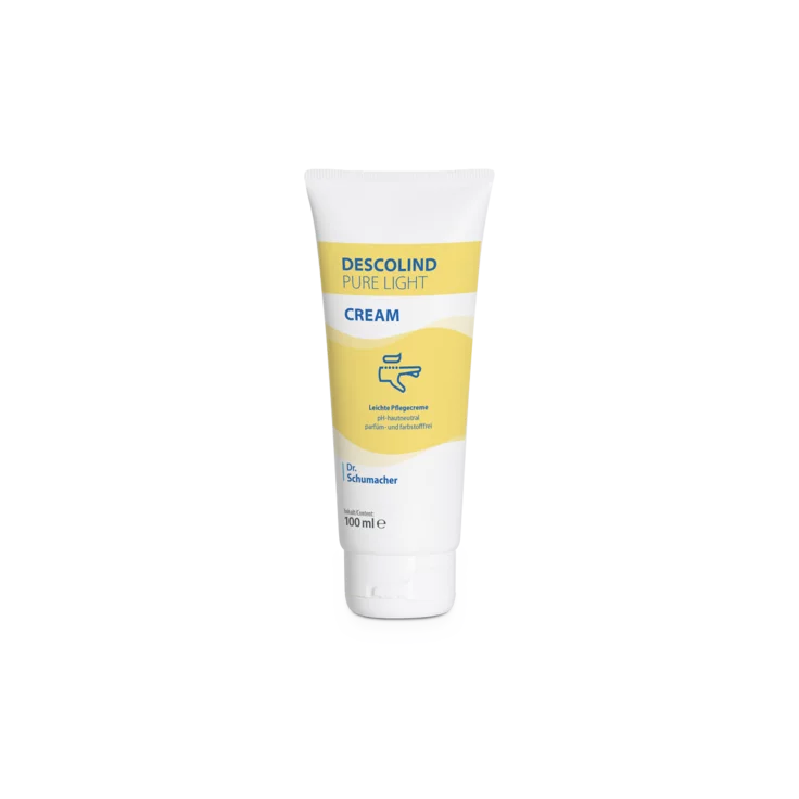 Un tube blanc de 100 ml de la crème de soin Descolind Pure Light Cream de Dr. Schumacher pour peaux sensibles avec des accents jaunes et bleus et le logo de Dr. Schumacher GmbH est debout sur un fond blanc simple. Idéal pour le personnel médical.