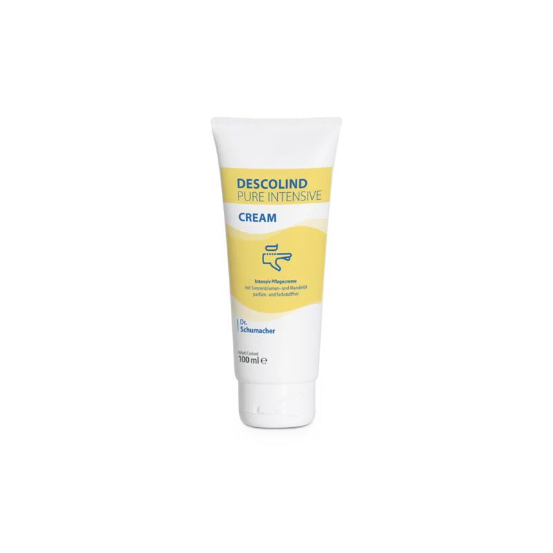 Un tube de 100 ml de la crème intensive Descolind Pure de Dr. Schumacher GmbH, une crème de soin intensif non parfumée pour peaux sensibles et sèches avec une étiquette jaune et blanche, est placé debout devant un fond blanc.