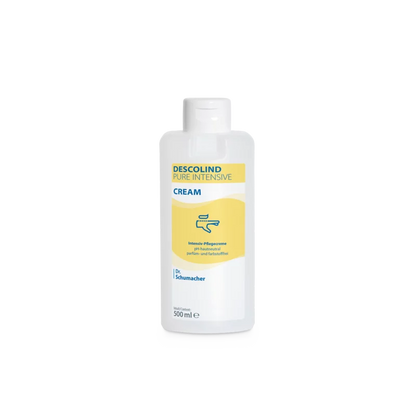 L'image montre une bouteille en plastique blanche de 500 ml de la crème intensive Descolind Pure de Dr. Schumacher GmbH, non parfumée et adaptée aux peaux sensibles, avec une étiquette jaune et bleue affichant un symbole de main, sur un fond blanc simple.