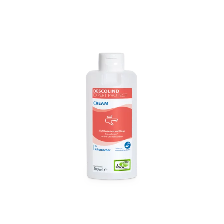 Une bouteille blanche de 500 ml de crème protectrice pour la peau Dr. Schumacher Descolind Expert Protect Cream de Dr. Schumacher GmbH avec une étiquette rouge et blanche, idéale pour les mains à risque d'allergie, se tient devant un fond clair.