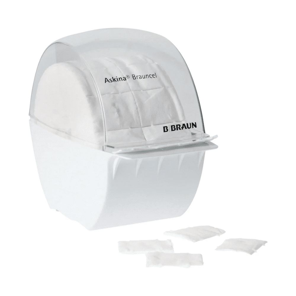 Un distributeur B. Braun Askina® Brauncel® pour tampons de cellulose - vide de B. Braun Deutschland GmbH & Co. KG est un distributeur en plastique blanc avec un couvercle transparent, destiné à contenir des tampons de cellulose. Quatre carrés identiques facilitent l'extraction hygiénique.