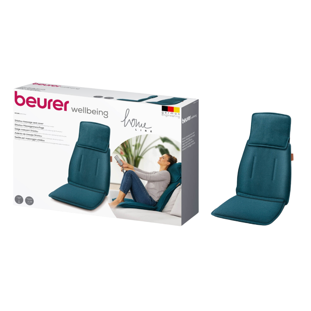 Une housse de siège de massage Shiatsu MG 330 Blue emballée Beurer, fabriquée par Beurer GmbH, est exposée à côté du produit non emballé. L'emballage montre une image d'une personne utilisant l'appareil de massage sur un canapé. L'appareil de massage bleu-vert, équipé d'un système de massage à 4 têtes, comprend un dossier et un coussin de siège.
