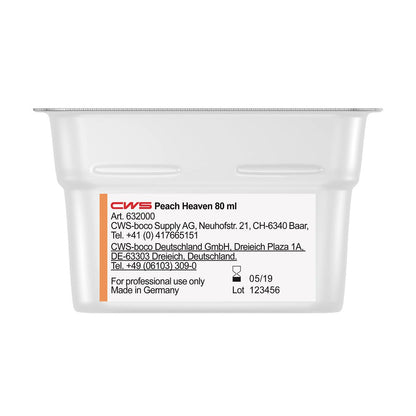 Un gros plan d'un conteneur blanc CWS ParadiseLine Parfum pour salle de bain pour diffuseur de parfum Paradise Air Bar, étiqueté avec des informations sur le produit, les informations de l'entreprise, "Fabriqué en Allemagne" et un couvercle transparent. Convient pour les installations de diffusion de parfum pour salle de bain.