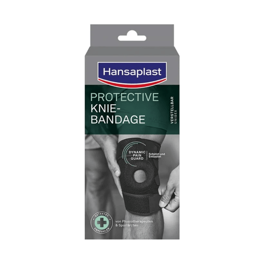 Vue de face d'une genouillère Hansaplast Protective de Beiersdorf AG, réglable | Boîte (1 pièce), avec la photo d'une personne portant la genouillère noire et des informations sur la stabilité en allemand et en anglais sur l'emballage.