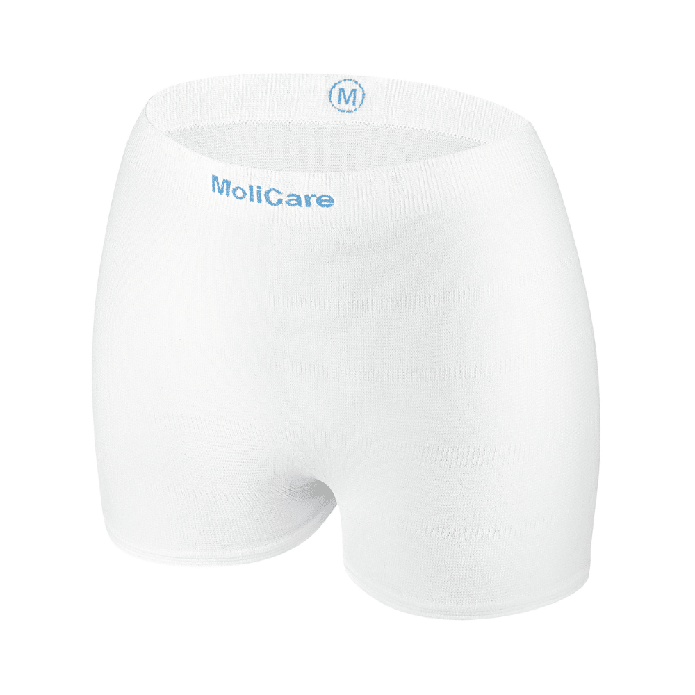 La culotte filet Hartmann MoliCare® Fixpants de Paul Hartmann AG est un sous-vêtement filet élastique blanc sans couture avec un "M" bleu et la marque sur la ceinture, idéal pour fixer des protections pour incontinence de taille moyenne.
