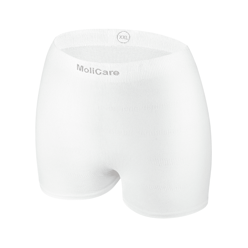 La culotte filet Hartmann MoliCare® Fixpants de Paul Hartmann AG est un pantalon élastique blanc sans couture avec l'inscription "MoliCare" et "XXL" sur la ceinture, qui maintient les protections pour incontinence en toute sécurité. Illustré sur un fond blanc simple.