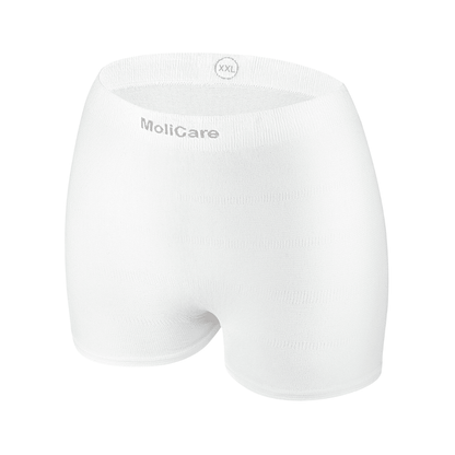 La culotte filet Hartmann MoliCare® Fixpants de Paul Hartmann AG est un pantalon élastique blanc sans couture avec l'inscription "MoliCare" et "XXL" sur la ceinture, qui maintient les protections pour incontinence en toute sécurité. Illustré sur un fond blanc simple.