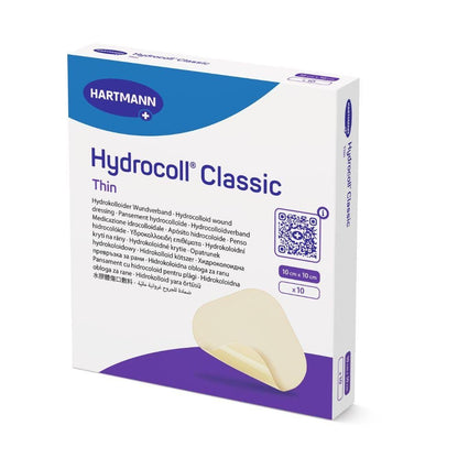 Un paquet de pansements stériles Hartmann Hydrocoll® Classic Thin, scellés individuellement de Paul Hartmann AG, contient 10 pièces (10 cm x 10 cm) avec le logo de la marque et une image partielle d'un pansement beige pour le traitement humide des plaies.