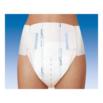 Une personne portant Hartmann MoliCare® Premium Elastic, 6 gouttes - taille S-XL de Paul Hartmann AG se tient devant un arrière-plan avec dégradé de couleurs. Seule la partie inférieure du torse est visible. La couche, conçue pour l'incontinence urinaire et fécale, a des languettes latérales réglables et des marques de motif bleues.