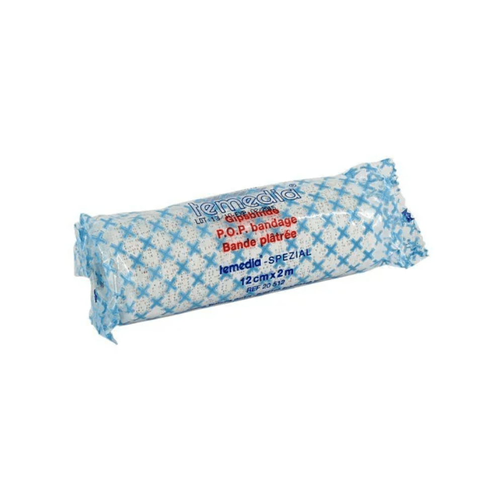 Un bandage roulé pour immobilisation est emballé dans un emballage bleu et blanc, porte l'inscription « Holthaus Temedia-Spezial Gipsbinde - 1 Binde » et « Bande plâtrée » et mesure 12 cm x 2 m. Le nom de la marque « Holthaus Medical GmbH & Co. KG » est imprimé sur l'emballage, adapté à l'immobilisation en cas de fractures.