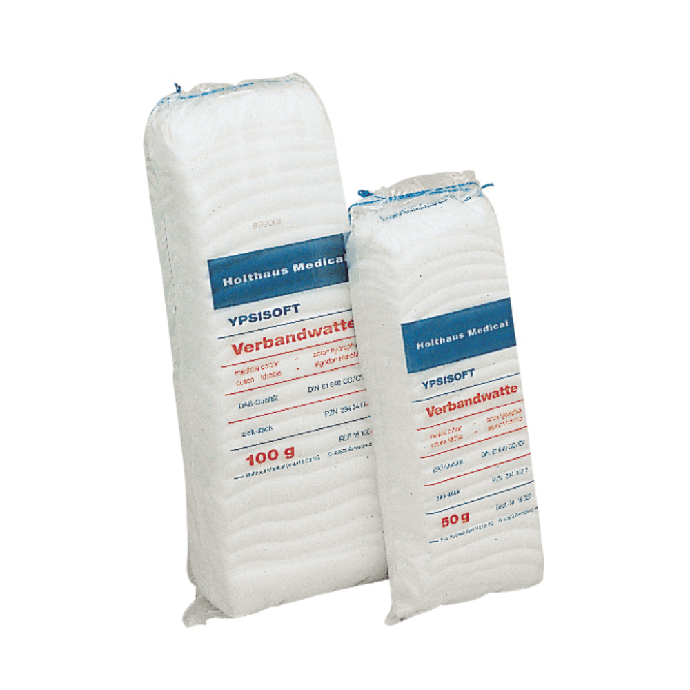 Deux paquets blancs de ouate de bandage Ypsisoft de Holthaus, un produit médical important pour le soin des plaies, sont disposés verticalement. Le paquet de gauche porte l'inscription « 100 g », celui de droite l'inscription « 50 g ». Les deux paquets affichent du texte et des marques, y compris le nom « Holthaus Medical GmbH & Co. KG ».