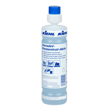 Une bouteille d'un litre de nettoyant universel à base d'alcool « Kiehl Keradet-Konzentrat-Aktiv » de la marque Johannes Kiehl KG, pour un nettoyage sans traces, dotée d'un bouchon bleu et d'une étiquette multilingue contenant des informations sur le produit et des consignes d'utilisation.