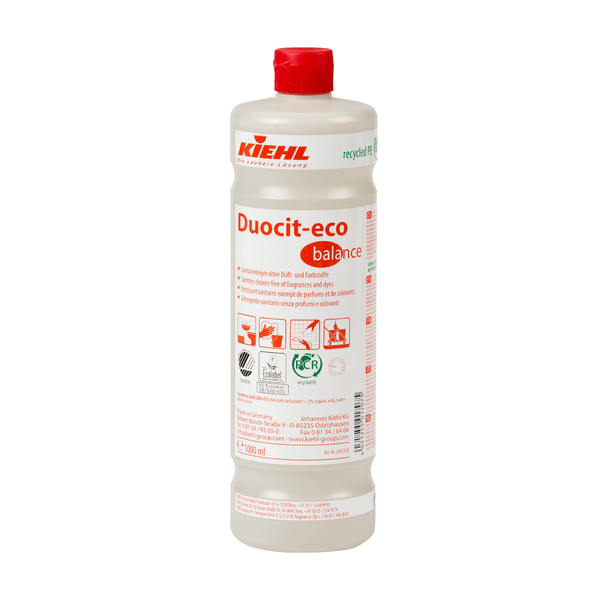 Une bouteille en plastique de 1 litre Johannes Kiehl KG Kiehl Duocit-eco balance nettoyant sanitaire sans parfum ni colorant avec un bouchon rouge et une étiquette blanche avec des informations sur le produit en rouge et noir, des symboles et des instructions d'utilisation.