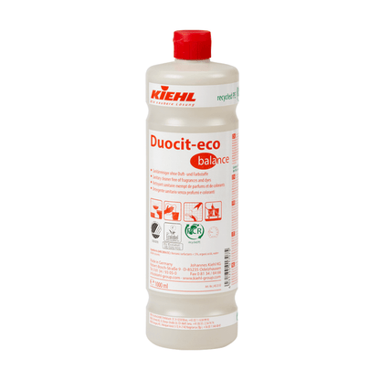 Une bouteille en plastique de 1 litre Johannes Kiehl KG Kiehl Duocit-eco balance nettoyant sanitaire sans parfum ni colorant avec un bouchon rouge et une étiquette blanche avec des informations sur le produit en rouge et noir, des symboles et des instructions d'utilisation.