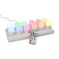 Papstar Securit® 12 bougies chauffe-plat LED incl. borne de recharge Ø 4 cm x 5 cm "Amsterdam" durée d'éclairage 12-40 heures