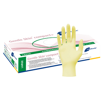 Devant une boîte ouverte de gants médicaux Meditrade Gentle Skin® Latexhandschuhe compact+ jetables, un gant jaune en latex est exposé, avec quelques gants visibles dans la boîte. Le texte sur la boîte indique qu'il s'agit de gants de grande taille.