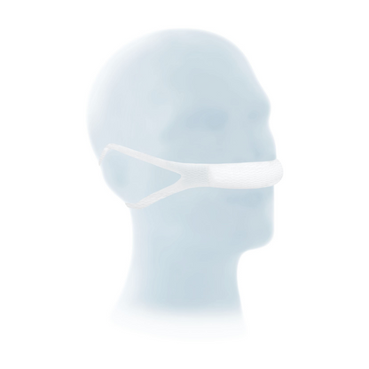 Une tête humaine transparente et éthérée avec un bandage nasal Meditrade ABE® blanc texturé autour de la bouche sur fond blanc, évoquant un sentiment de silence ou de censure.