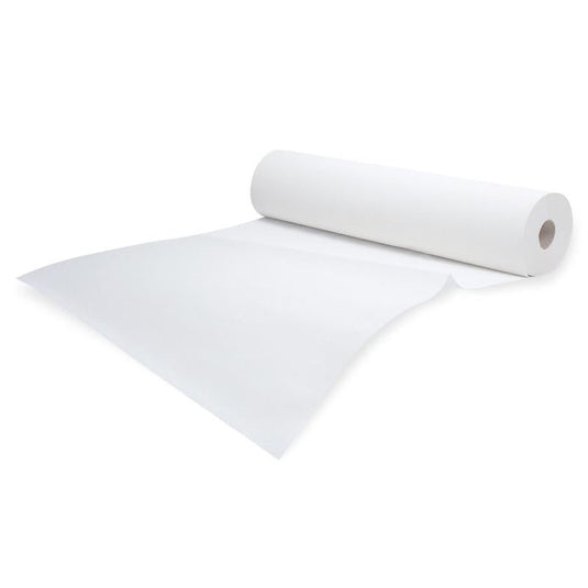 Un rouleau de papier crêpé médical blanc Meditrade Rollicel®, légèrement déroulé devant un fond blanc uni. Le rouleau est placé en diagonale, son extrémité étant légèrement repliée sur le côté.
