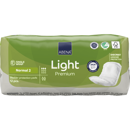 Un paquet ABENA Light Normal 2, Premium de Abena Re-Seller GmbH (12 pièces) offre une protection discrète contre les fuites et une haute capacité d'absorption. L'emballage vert et blanc présente des informations sur le produit et des pictogrammes pour montrer les avantages supplémentaires.