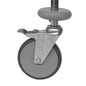 Un volant gris avec des disques d'amortissement Novocal (1 ensemble = 4 pièces, emballage 1 pièce), un arceau en métal et un frein à pied, fixé à une tige en métal - parfait comme remplacement de chariot de tri par Novocal.