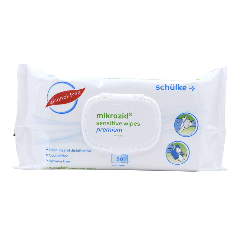 Un paquet de Mikrozid® sensitive Wipes Jumbo de Schülke & Mayr GmbH. Le paquet blanc contient 50 lingettes sans alcool et sans parfum, présenté avec un couvercle rabattable. Des icônes illustrent l'utilisation sur les peaux sensibles.