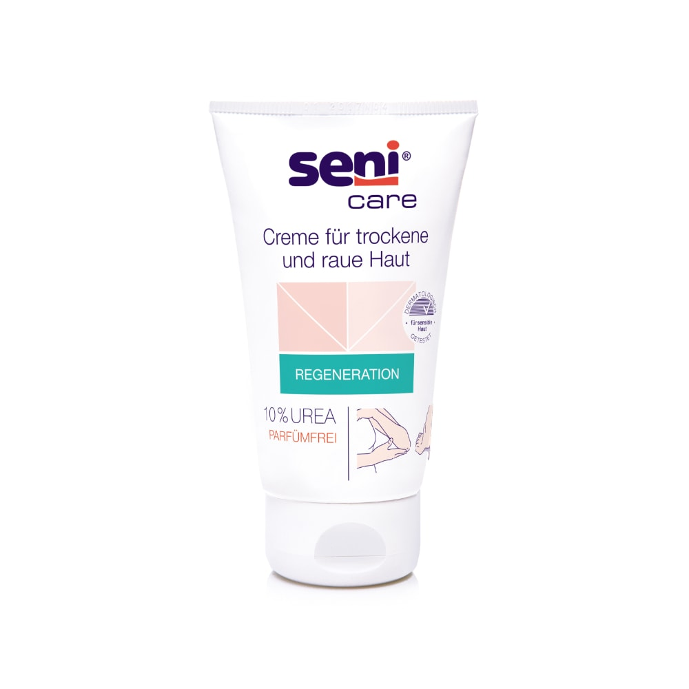 Un tube de 100 ml de crème Seni Care de TZMO Deutschland GmbH pour peau sèche et rugueuse a un fond blanc avec des accents rose pâle et verts. L'étiquette indique 10 % d'urée, est sans parfum, augmente l'hydratation et contient des instructions en allemand.