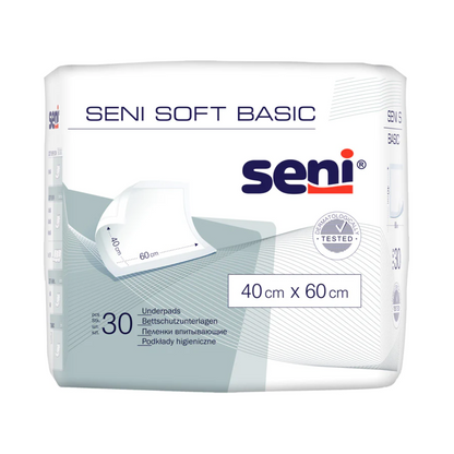 Un pack de 30 protections de lit Seni Soft Basic (différentes tailles) de TZMO Deutschland GmbH dans un sac blanc avec des accents bleu-gris offre une protection fiable. Le logo Seni et les informations sur le produit sont clairement visibles.