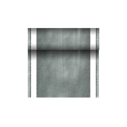 Un rouleau de chemin de table vert semblable à un tissu de la PAPSTAR chemin de table PV-Tissue Mix « ROYAL Collection » avec des bords blancs nets est partiellement déroulé devant un fond blanc simple. Ce produit fabriqué par la PAPSTAR GmbH présente un aspect légèrement vieilli en raison de sa composition unique de mélange de cellulose-viscose-tissu.