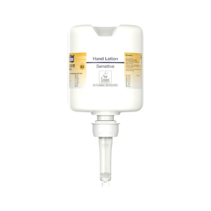 Un distributeur de lotion pour les mains Tork 420202 en blanc avec une buse transparente et l'inscription « Désinfection des mains hydratante sensible » en petites lettres offre un design minimaliste, axé sur la distribution de lotion hydratante, parfait pour le soin des peaux sensibles.