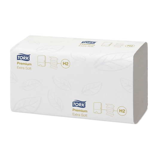 Le produit présenté est un paquet rectangulaire de serviettes Tork Xpress® 100297 extra-douces Multifold H2, conditionnées dans un emballage blanc orné d’un motif discret de feuilles. Les mentions « Tork Xpress® » et « H2 » sont imprimées en bleu et or et reflètent la qualité haut de gamme de TORK – Essity Professional Hygiene Germany GmbH.