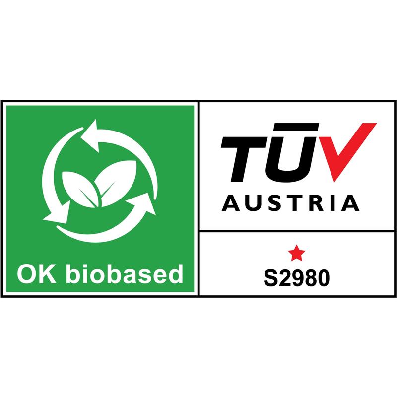 Le distributeur de ruban de table Scotch™ Karim Rashid de 3M Deutschland GmbH dispose d'une étiquette de certification avec une zone verte avec un symbole de recyclage et des feuilles avec l'inscription "OK biobased" ainsi qu'une zone blanche avec "TÜV AUSTRIA", une étoile rouge et "S2980".