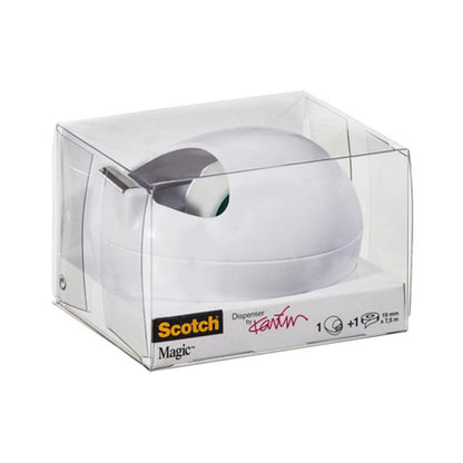 Un distributeur de ruban de table Scotch™ Karim Rashid de 3M Deutschland GmbH est dans un emballage en plastique transparent avec un distributeur blanc et une étiquette à l'avant avec des détails de marque et de produit en lettres noires et jaunes.