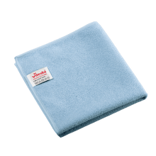 Chiffon en microfibre bleu plié « Vileda Professional r-MicroTuff Swift » muni d'une étiquette blanche cousue sur lequel figurent le nom de la marque et les symboles d'entretien.