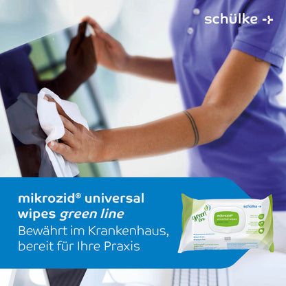 Sur cette image, qui fait la promotion des « lingettes désinfectantes mikrozid® universal wipes green line » de Schülke & Mayr GmbH, quelqu'un nettoie un écran d'ordinateur avec une lingette blanche. Au premier plan, on voit l'emballage contenant 114 lingettes pour la désinfection hospitalière et la désinfection rapide avec peu d'alcool.