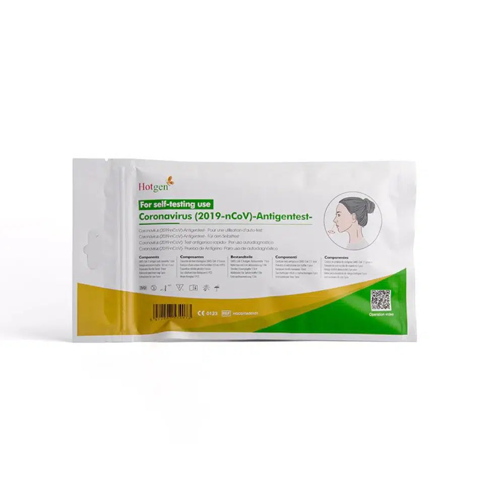 Le Hotgen Sars-CoV-2 Antigen Laien Schnelltest CE0123, un autotest fiable pour la détection du SARS-CoV-2, se distingue par un marquage vert-jaune frappant. L'emballage contient à l'avant une illustration avec des instructions pour l'écouvillonnage nasal et est conçu en plusieurs langues pour garantir une utilisation facile.